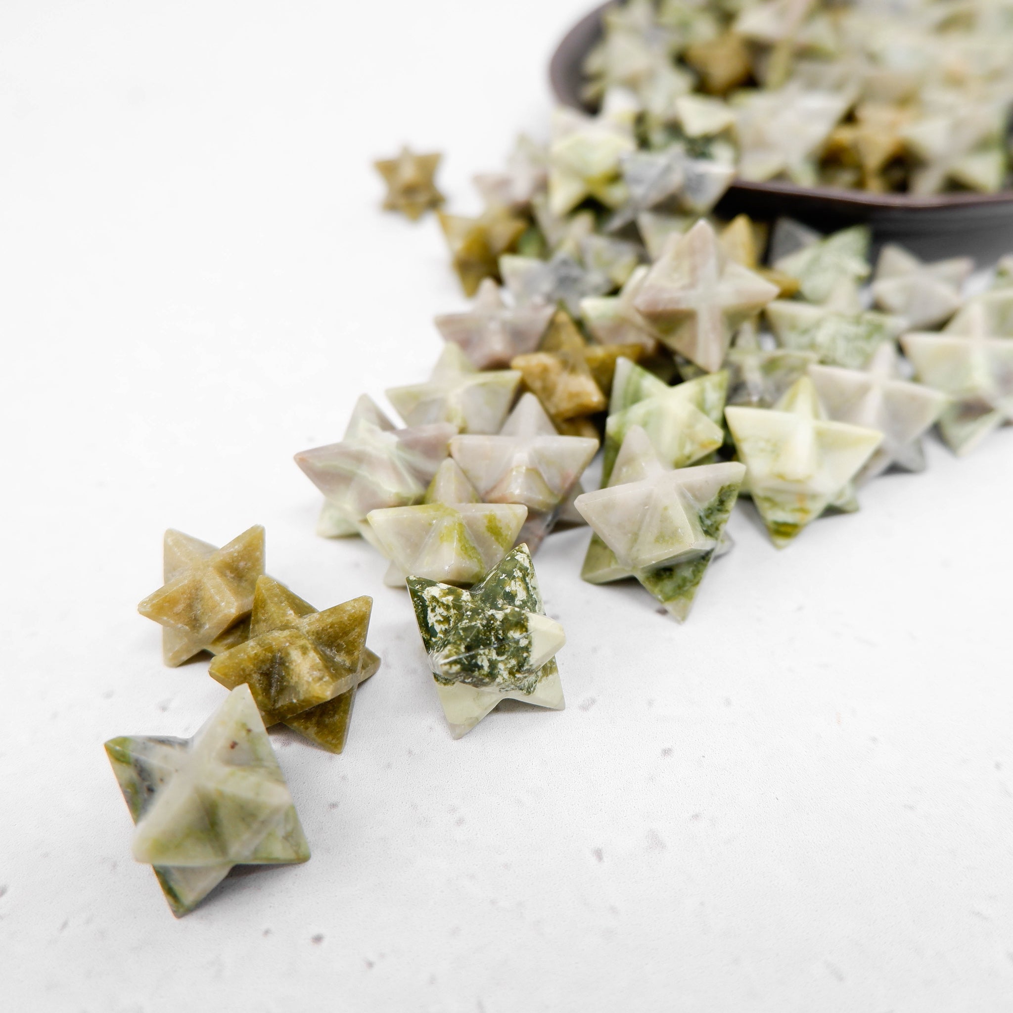 Noctis Studio Serpentine Star sculpture with intricate star-shaped design and swirling pattern in a metallic finish.