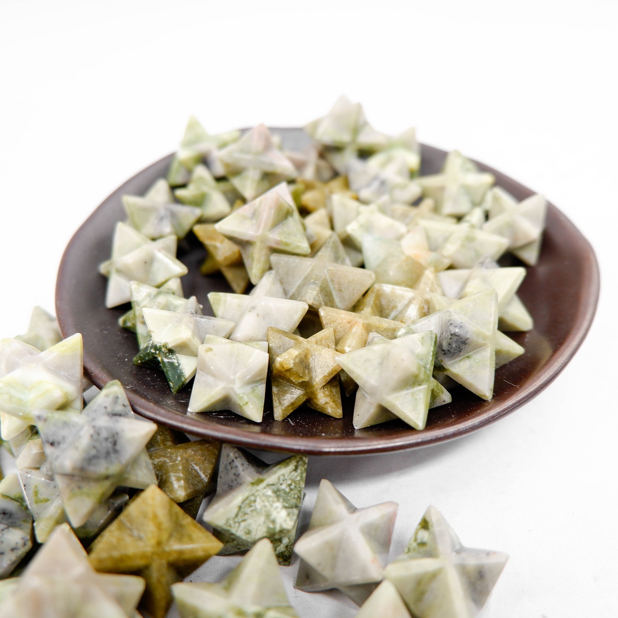 Noctis Studio Serpentine Star sculpture featuring a unique star shape with intricate patterns and a glossy finish.