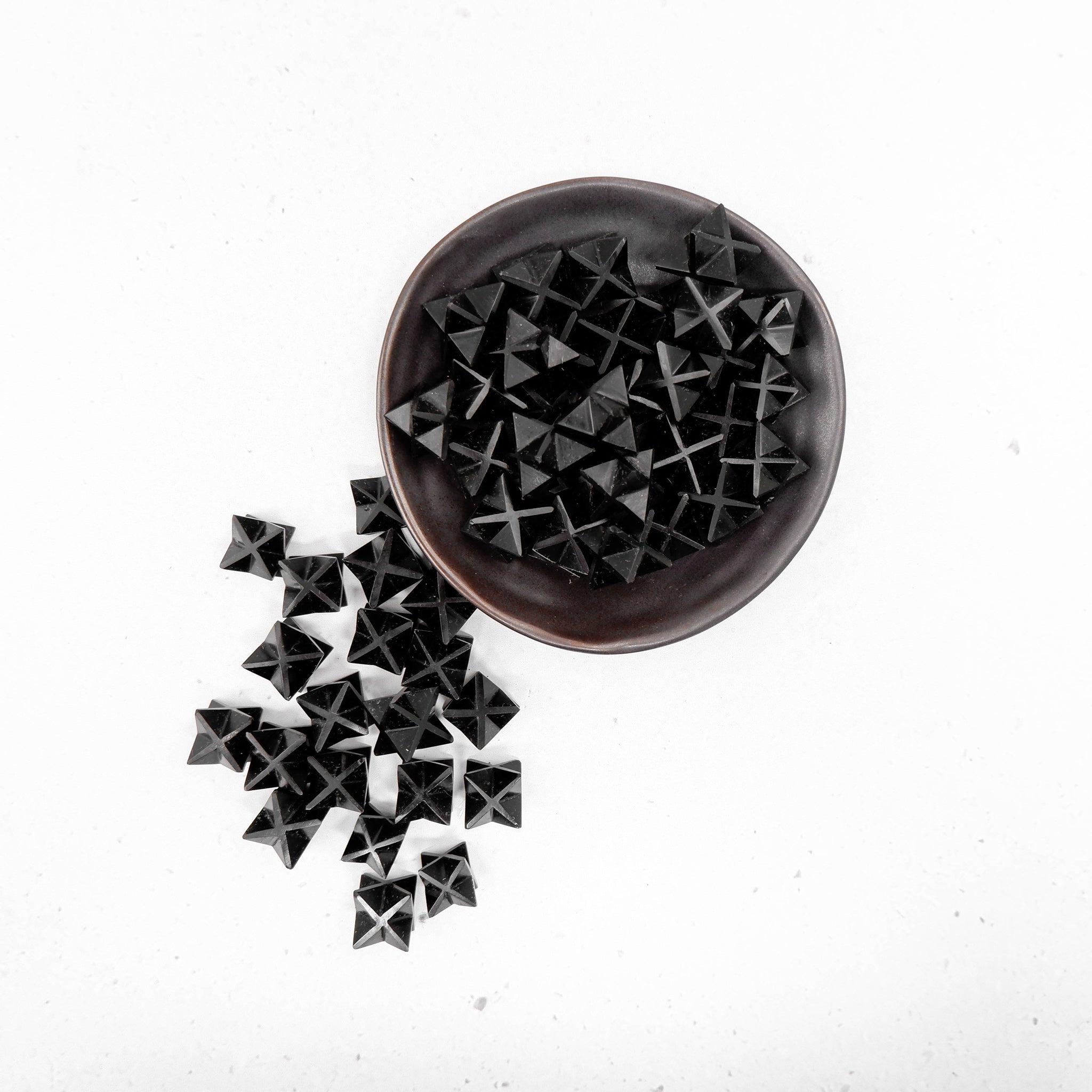 Black Jasper Star from Noctis Studio, showcasing a polished star-shaped gemstone with deep black and subtle mineral patterns.