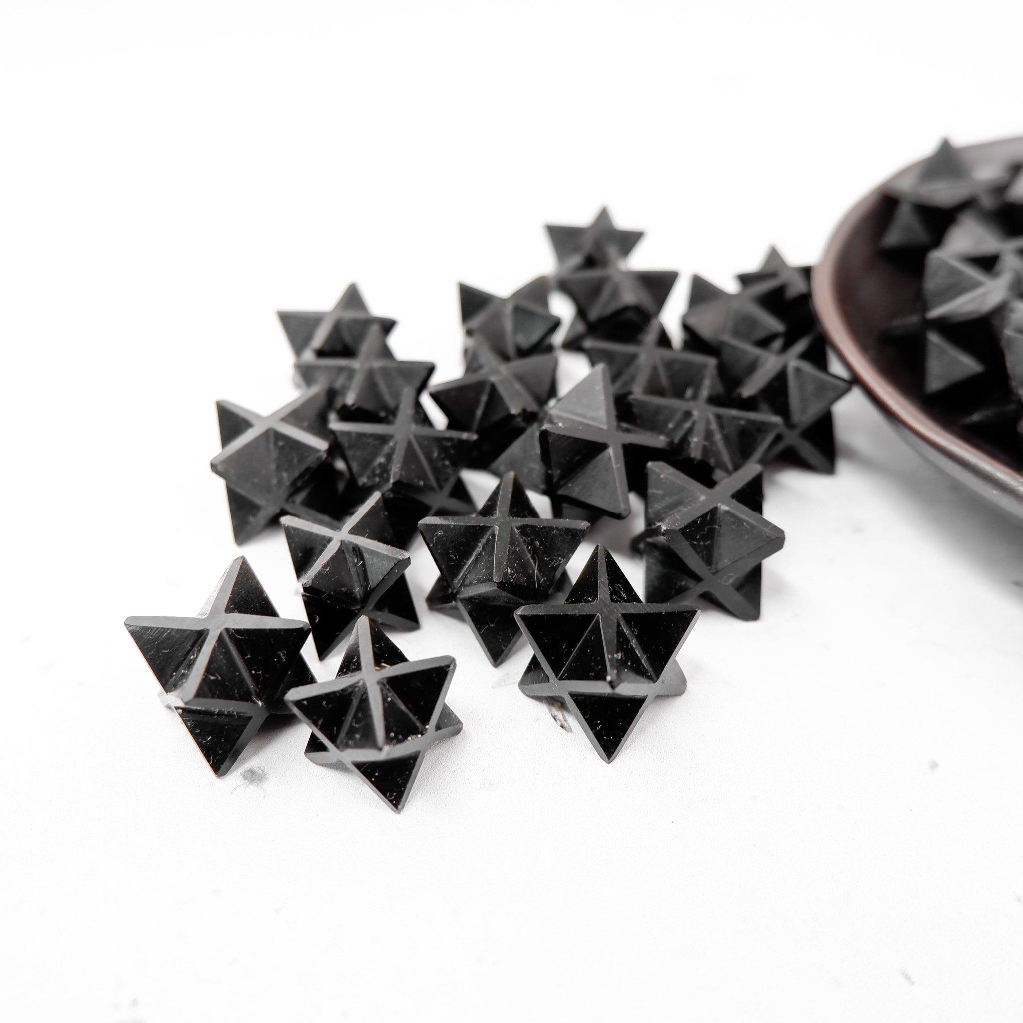 Black Jasper Star pendant by Noctis Studio, featuring a polished black jasper stone shaped as a star with natural patterns.