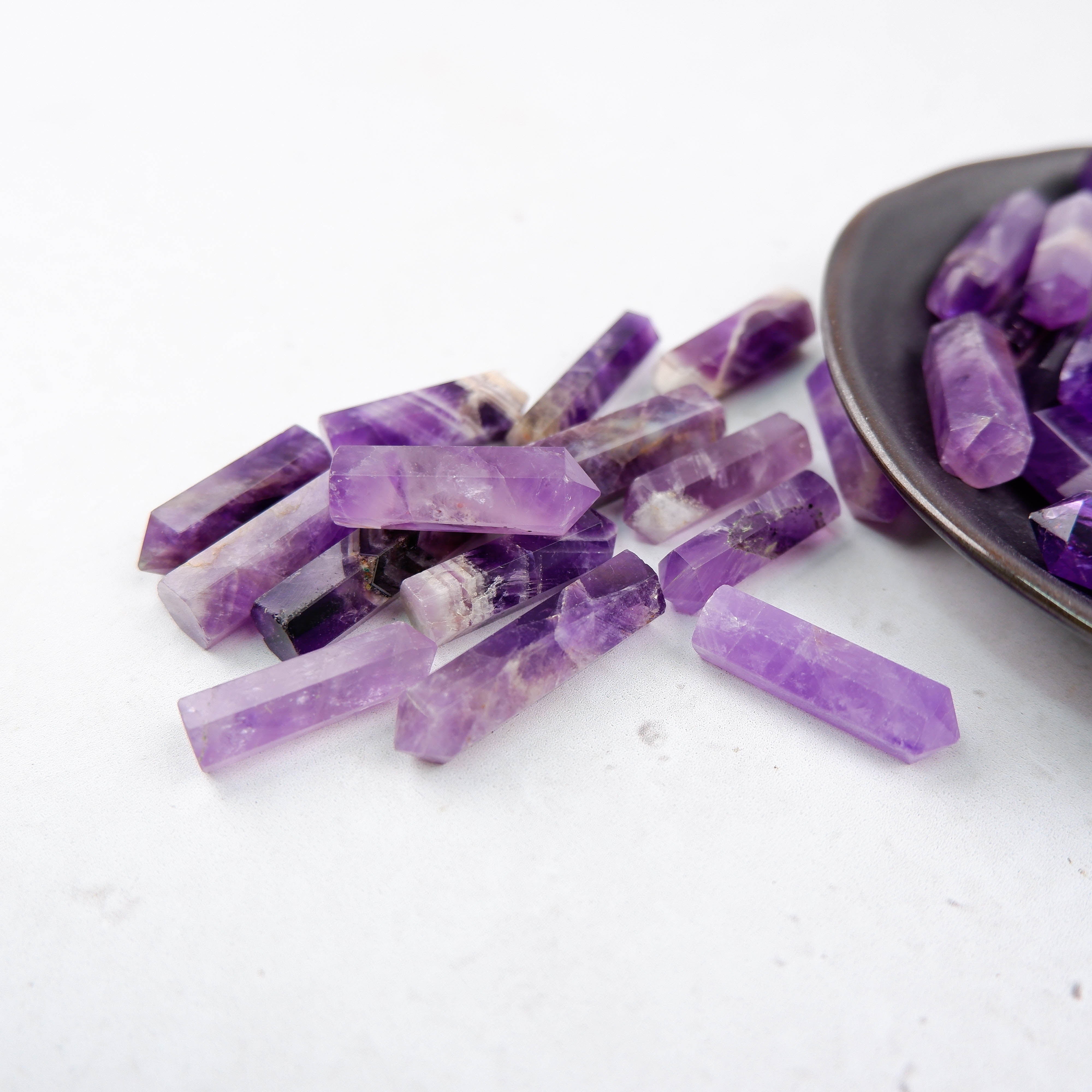 Noctis Studio amethyst single gridding point with polished, pointed crystal for gemstone setting or jewelry making.
