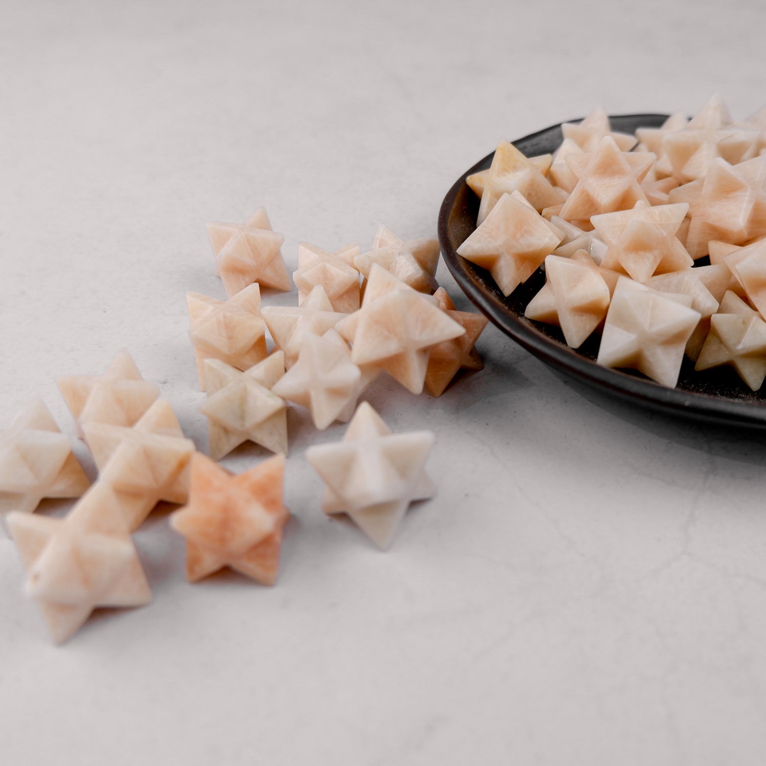 Cream Moonstone star-shaped jewelry piece by Noctis Studio, featuring smooth, polished moonstone with a star design.