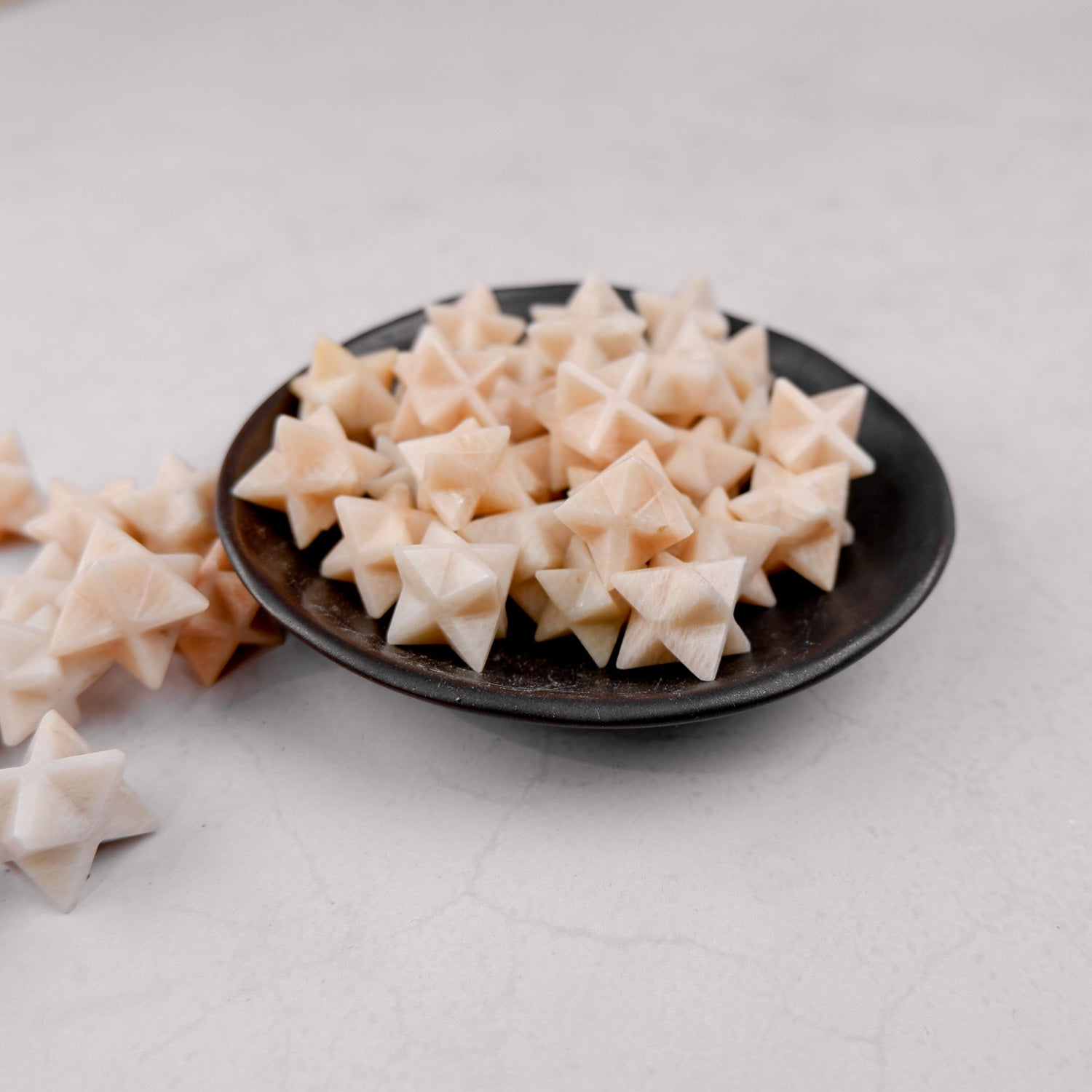 Cream Moonstone star pendant by Noctis Studio, featuring a smooth moonstone gemstone shaped as a star.