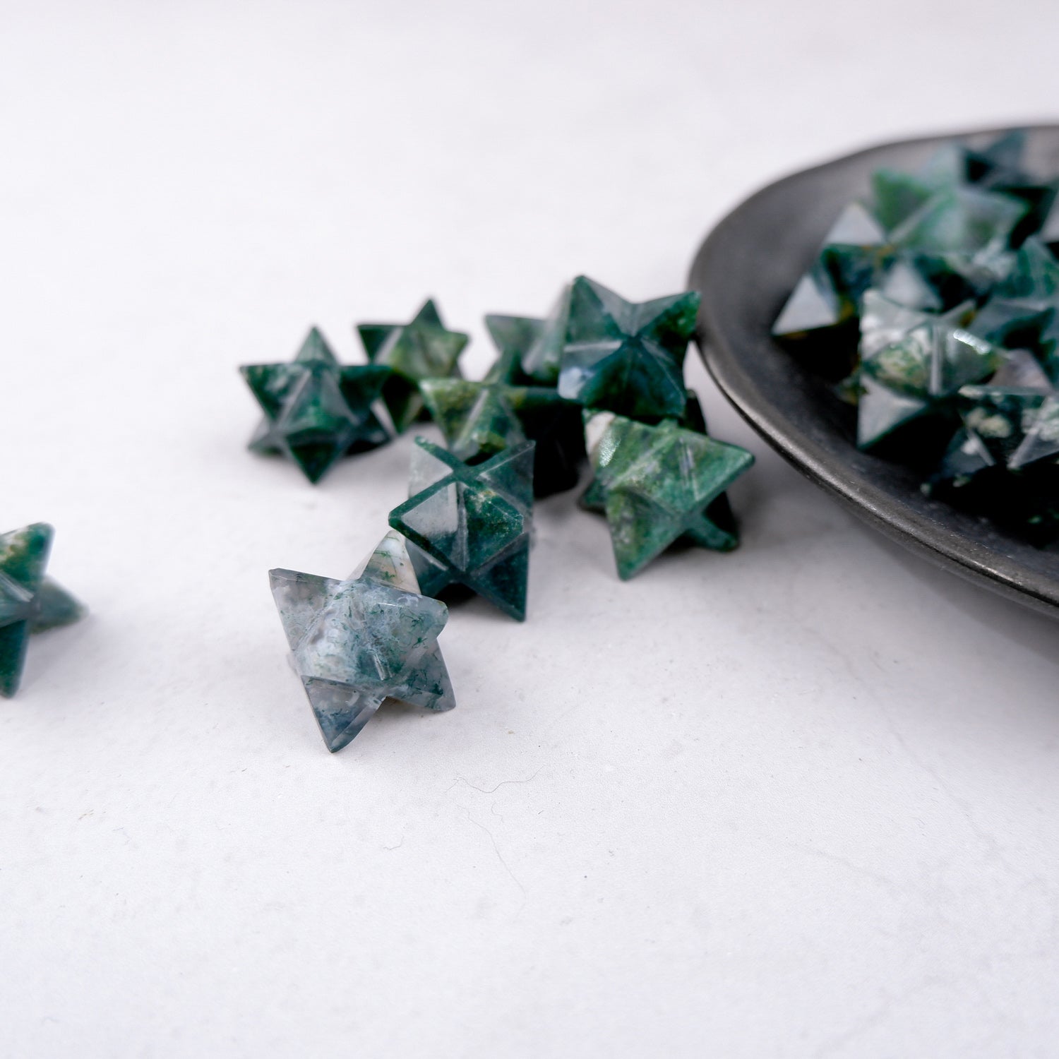 Noctis Studio Moss Agate Star pendant featuring a polished, natural moss agate gemstone carved into a star shape.