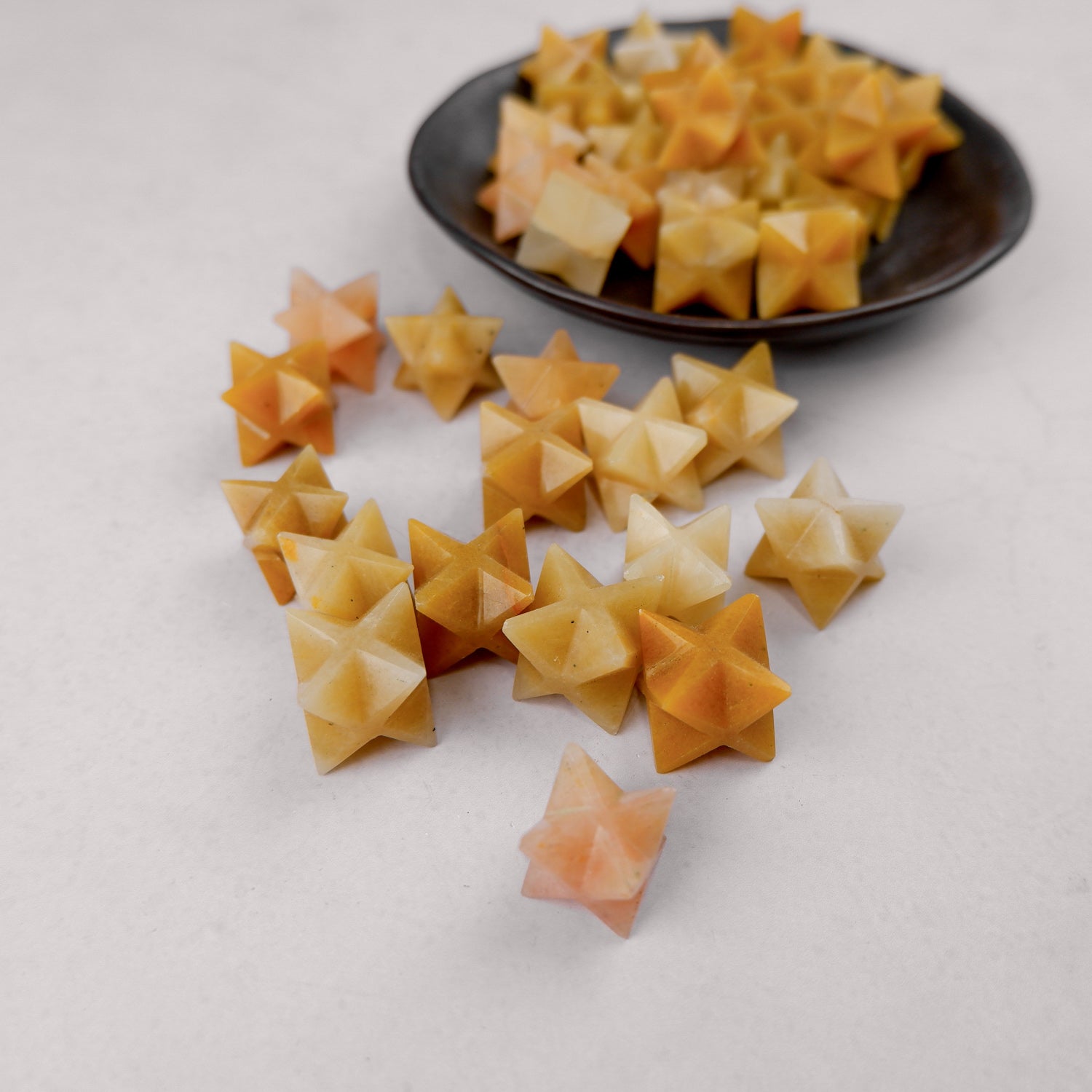 Yellow Aventurine star sculpture from Noctis Studio, smooth polished gemstone with a five-pointed star shape.