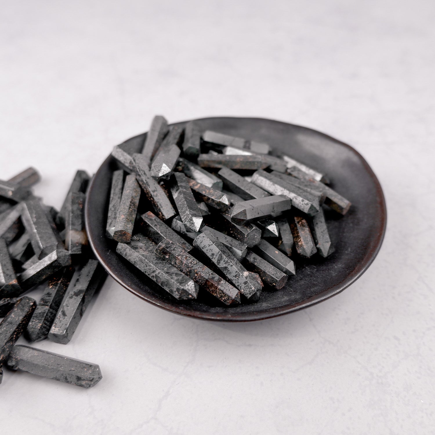 Hematite single gridding point by Noctis Studio, metal tool with pointed tip for precise crafting and detailed work.