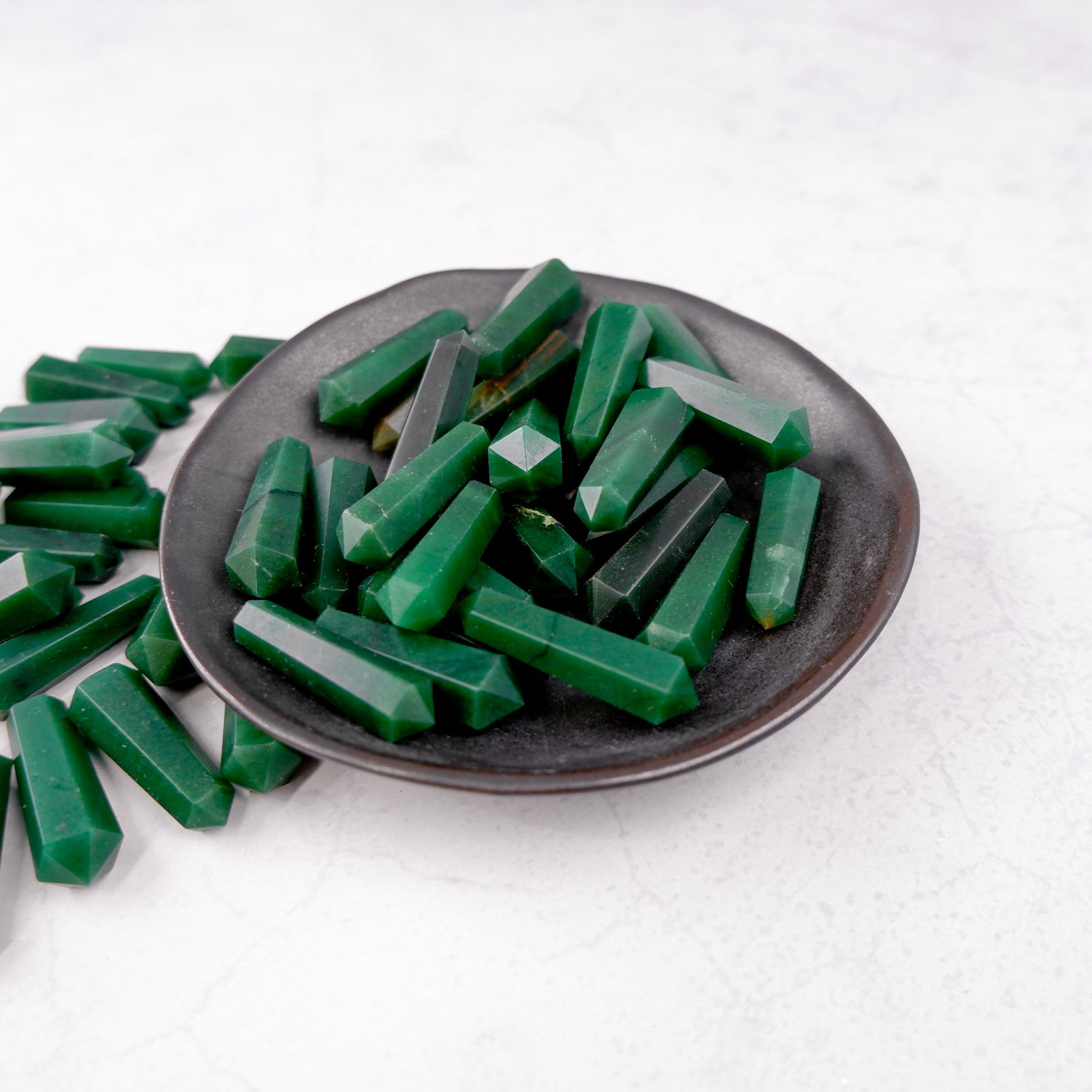 Dark green aventurine double gridding point by Noctis Studio, featuring polished stone with pointed ends for crystal healing.