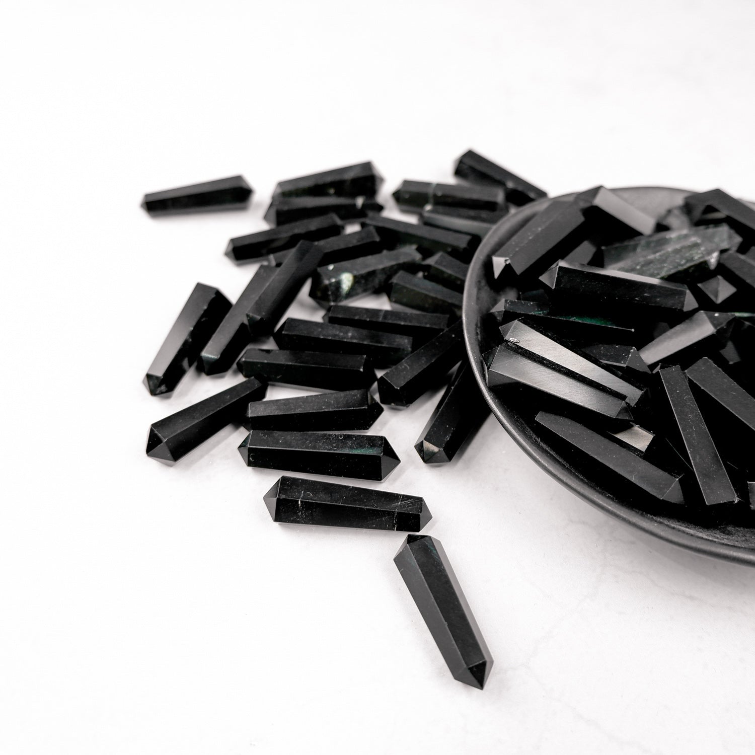 Obsidian Double Gridding Point by Noctis Studio, a detailed close-up of the crafting tool with obsidian material and intricate design.