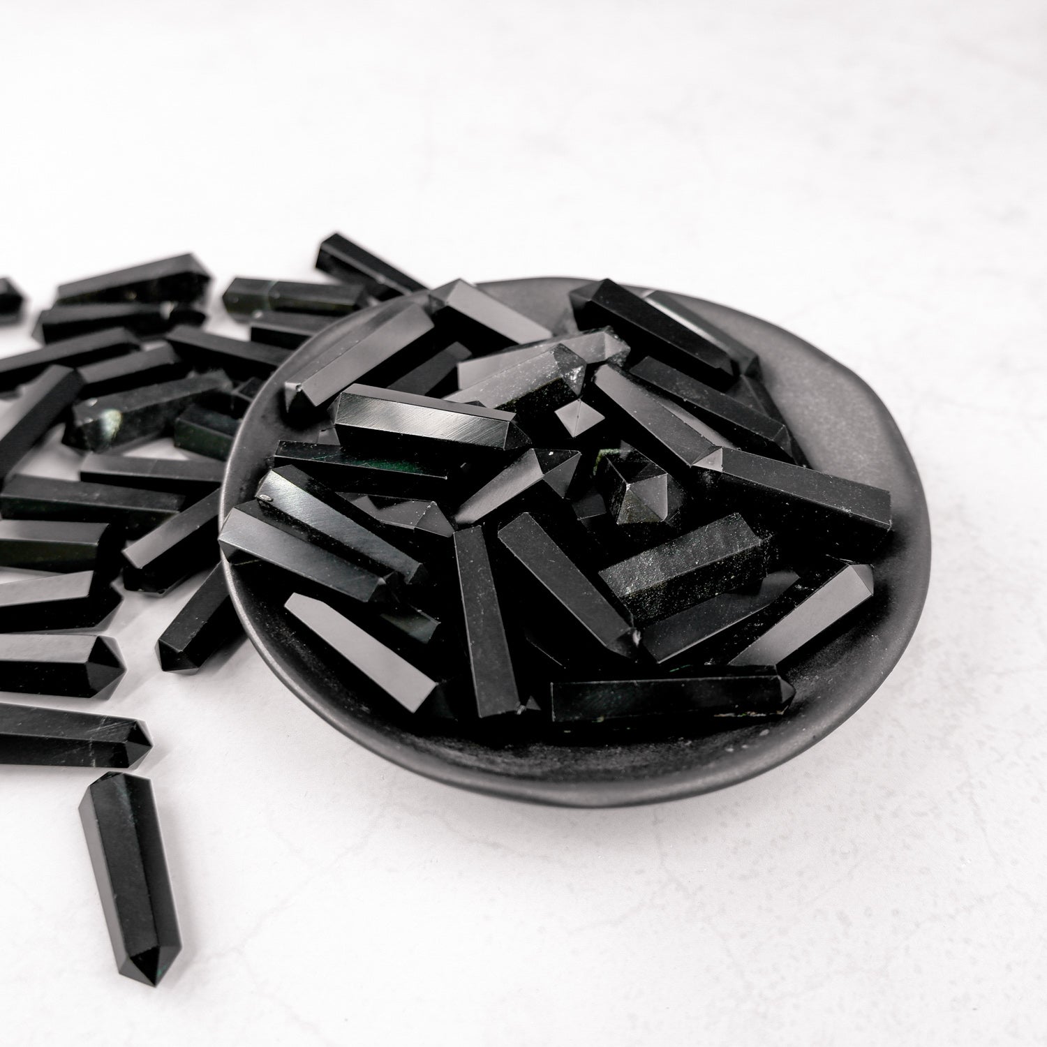 Noctis Studio Obsidian Double Gridding Point, a detailed black ceramic tool for precise crafting and jewelry making.