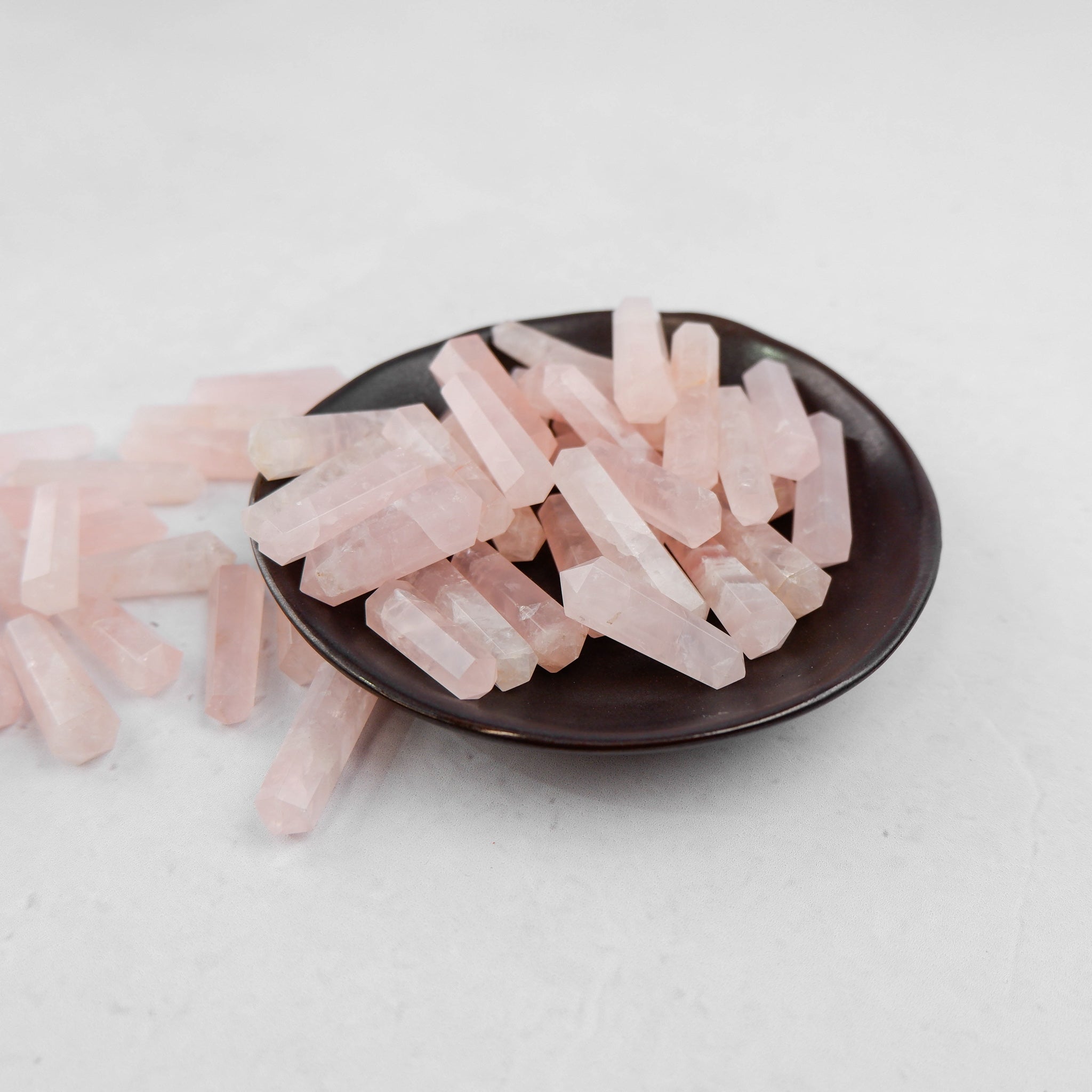 Rose Quartz double gridding point by Noctis Studio, a smooth pink crystal tool for skincare or energy work.
