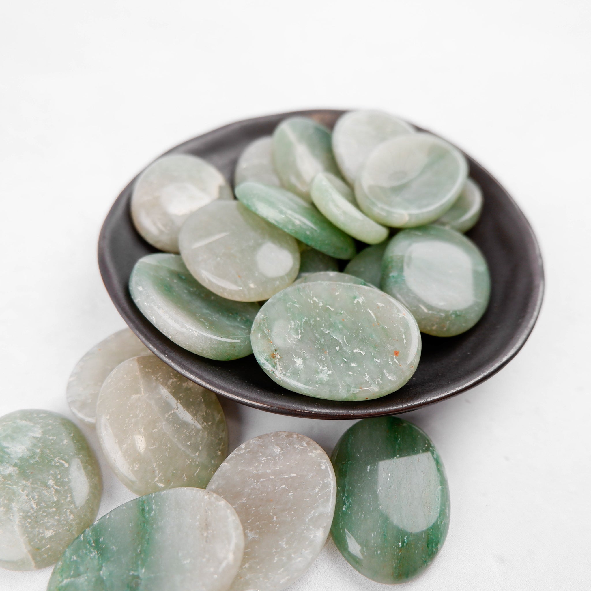 Green Aventurine worry stone from Noctis Studio, smooth polished gemstone with rounded shape, ideal for calming and stress relief.