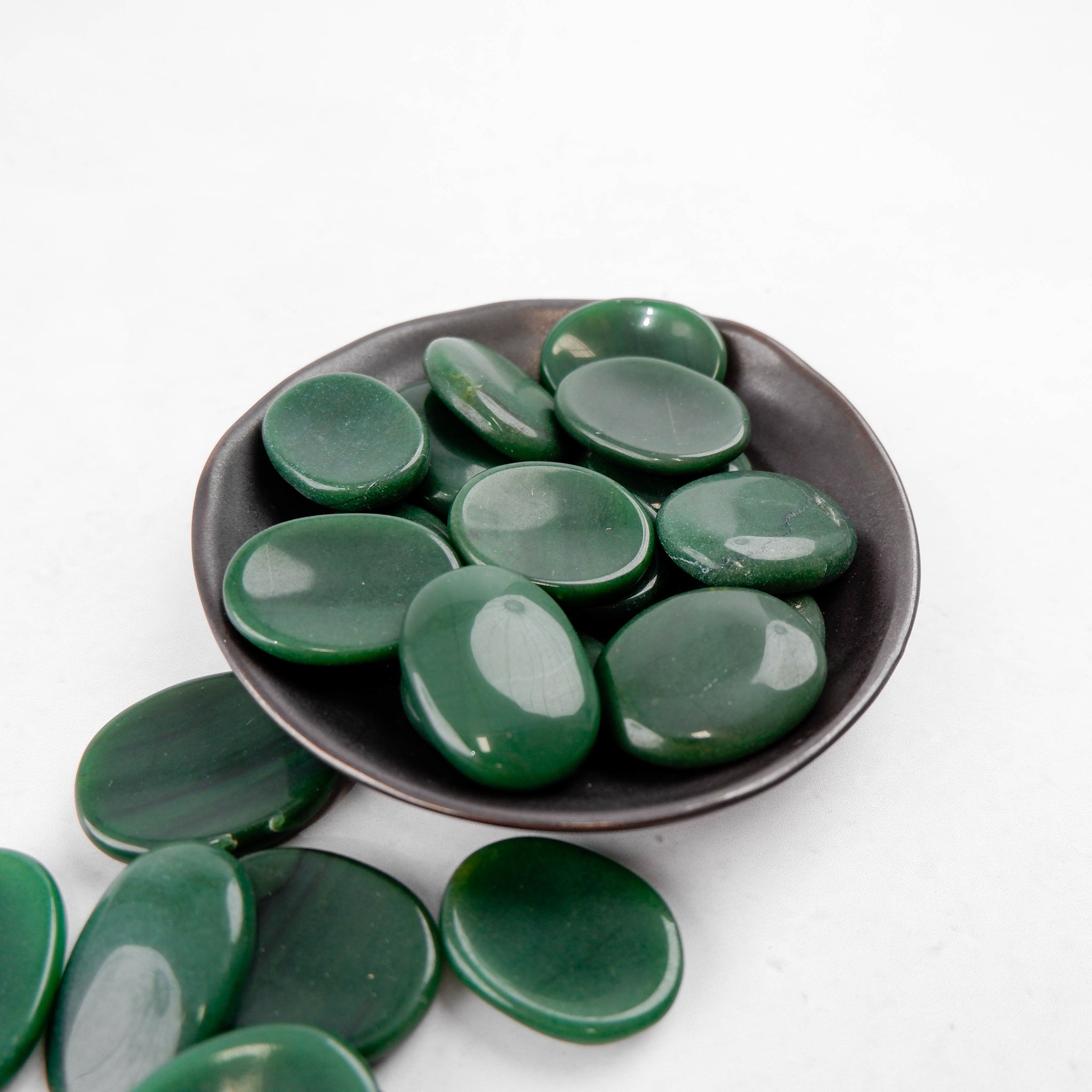 Dark green aventurine worry stone from Noctis Studio, polished smooth gemstone for calming and stress relief.