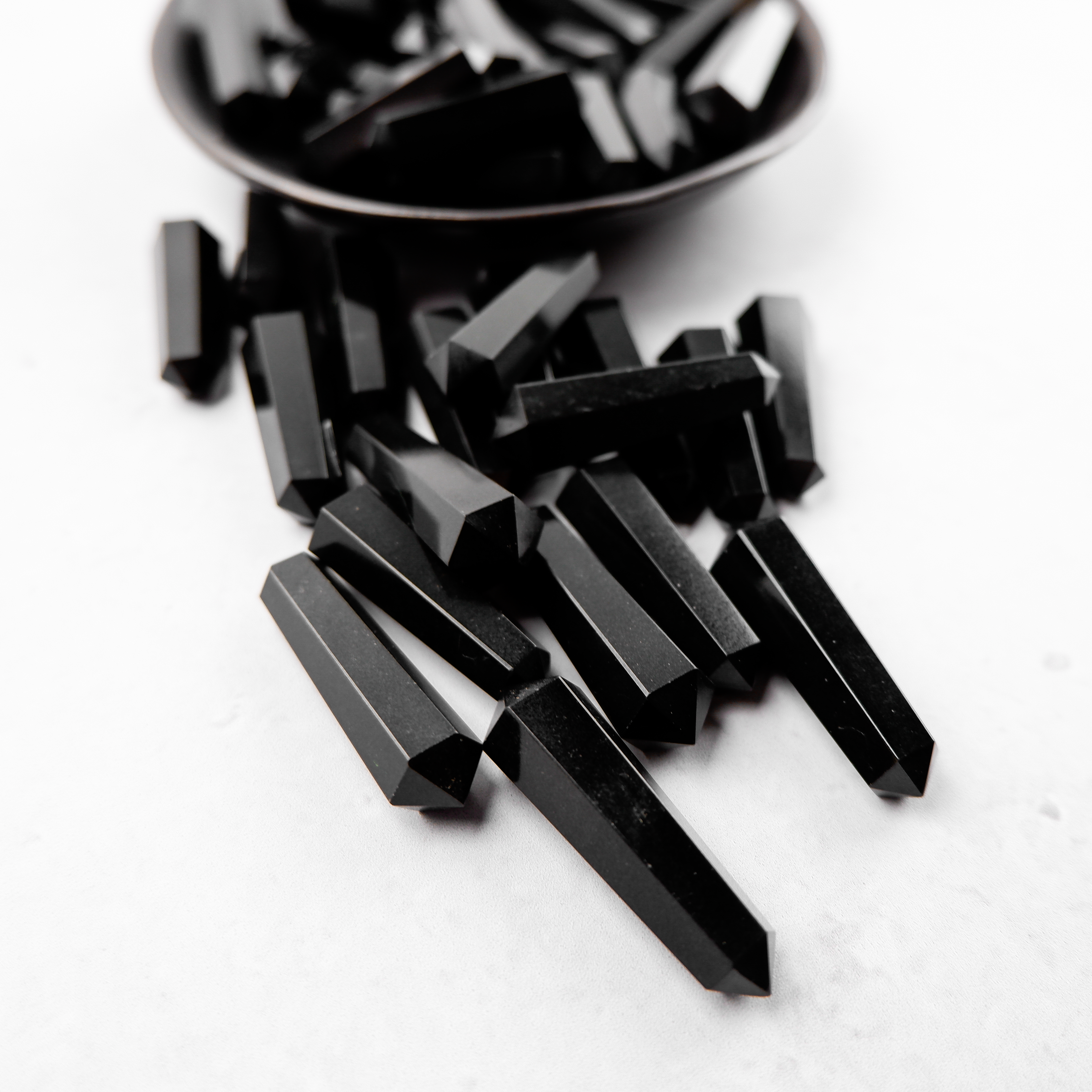 Black Jasper Double Gridding Point by Noctis Studio, featuring a polished black jasper stone with dual-point design for jewelry making.