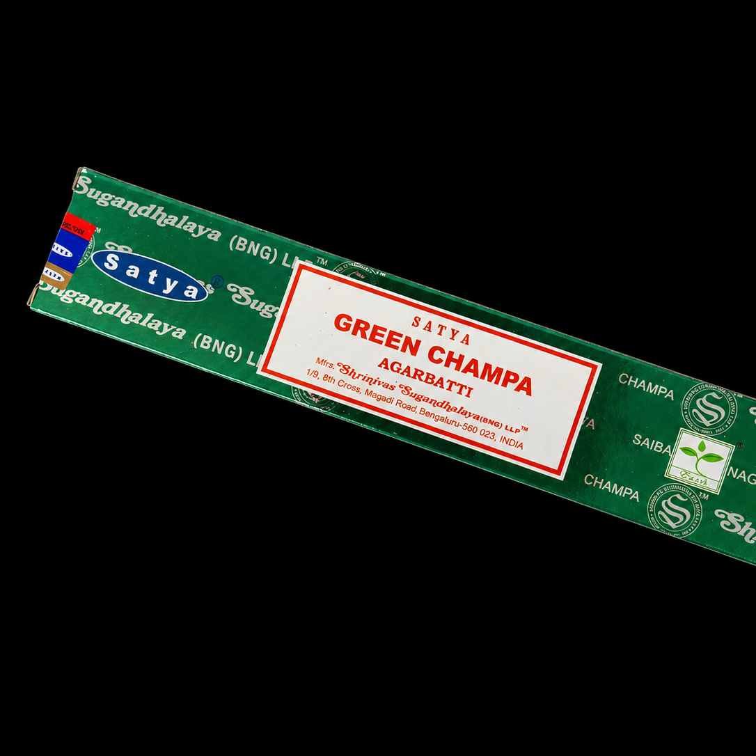 Green Champa Satya Incense sticks from Noctis Studio, showing the packaging and incense sticks with green and white design.