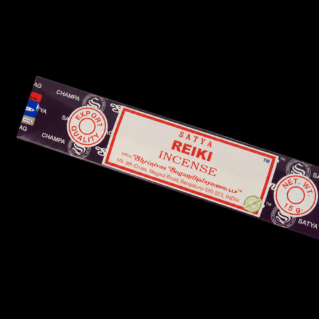Reiki Satya Incense sticks in a box from Noctis Studio, with packaging and incense sticks visible.