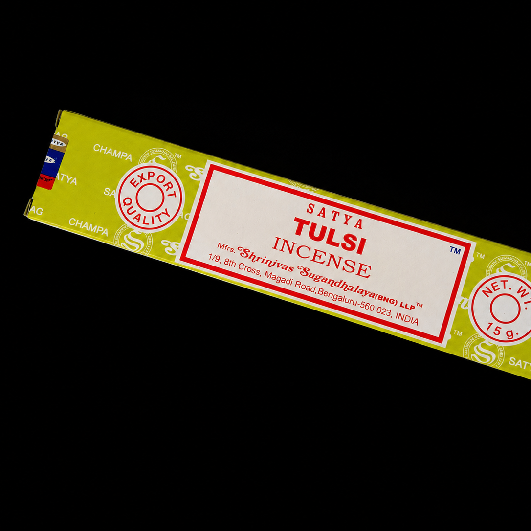 Noctis Studio Tulsi Satya Incense sticks with burning incense cone and box, showcasing natural herbal fragrance and traditional packaging.