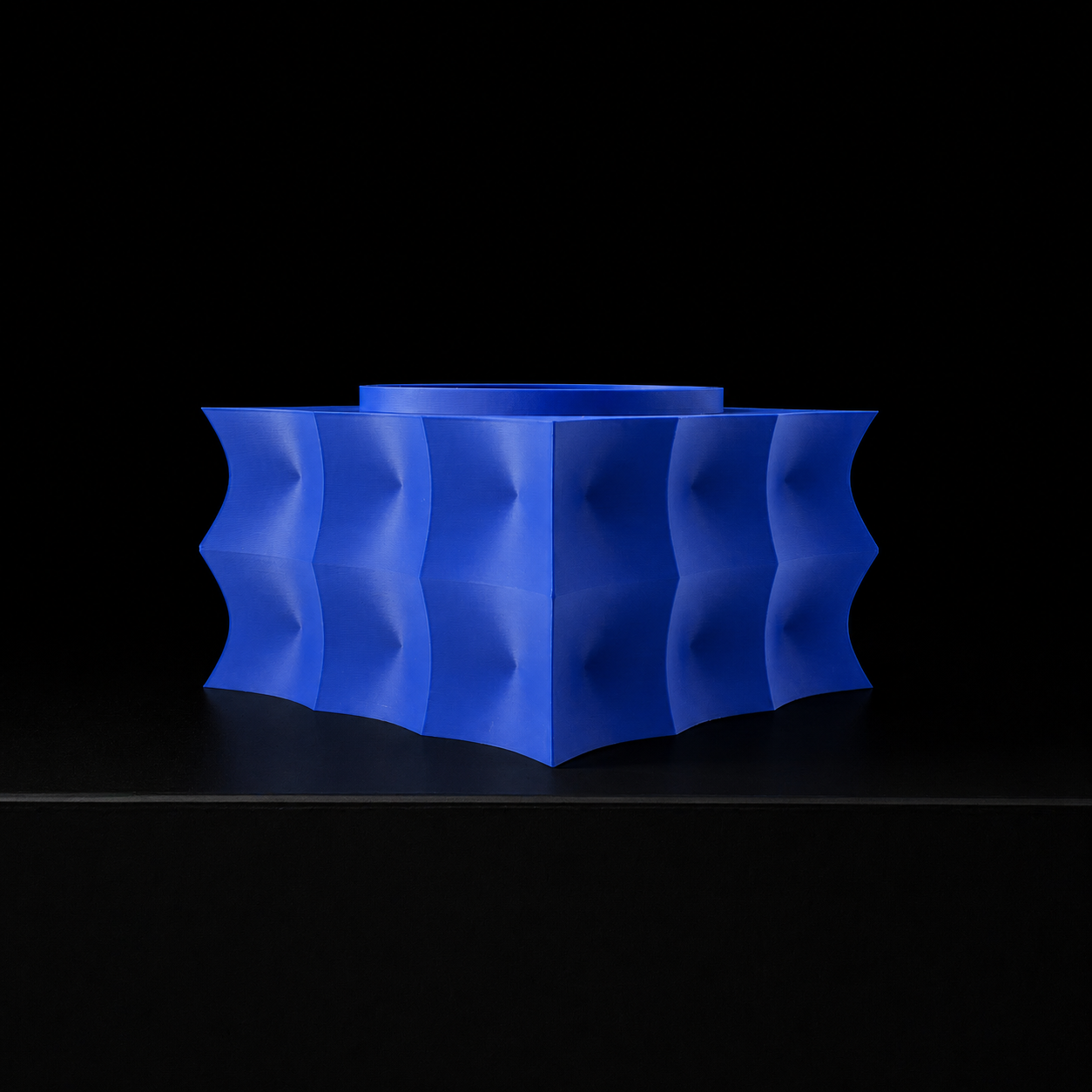 Modern Machine Prism Planter with geometric design, featuring a sleek, minimalist appearance perfect for indoor or outdoor plants.