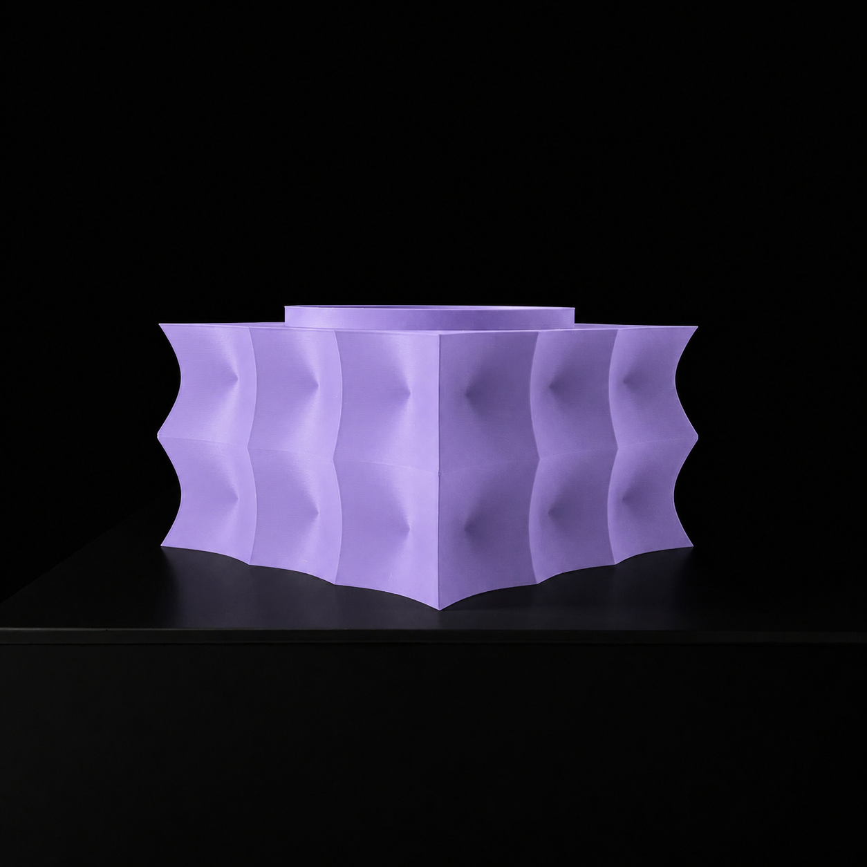 Modern Machine Prism Planter showcasing geometric design in sleek ceramic with a small plant inside.
