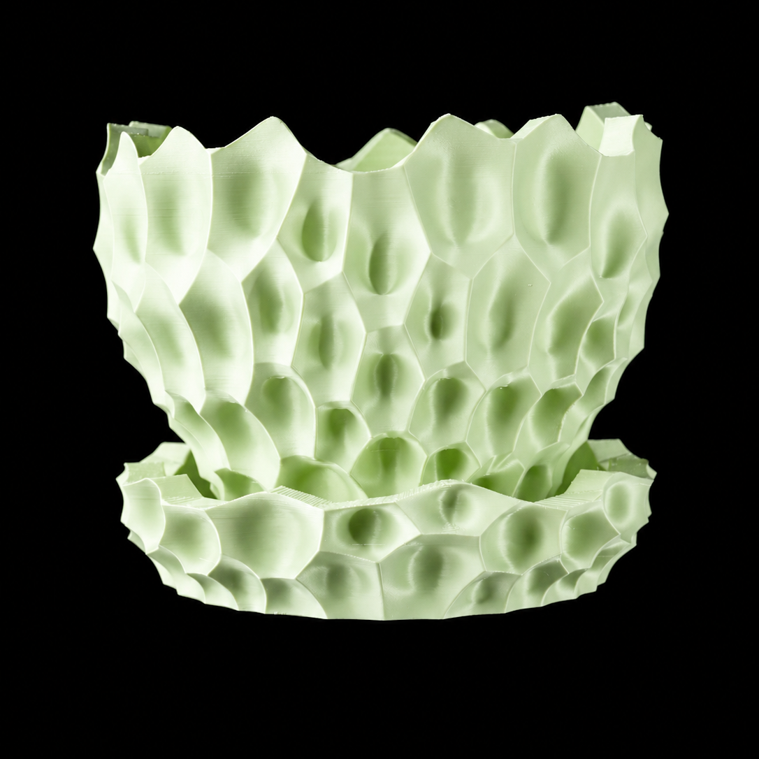 Modern Machine Thorn Planter showcasing a sleek, contemporary design with textured surface and stylish shape for indoor or outdoor use.