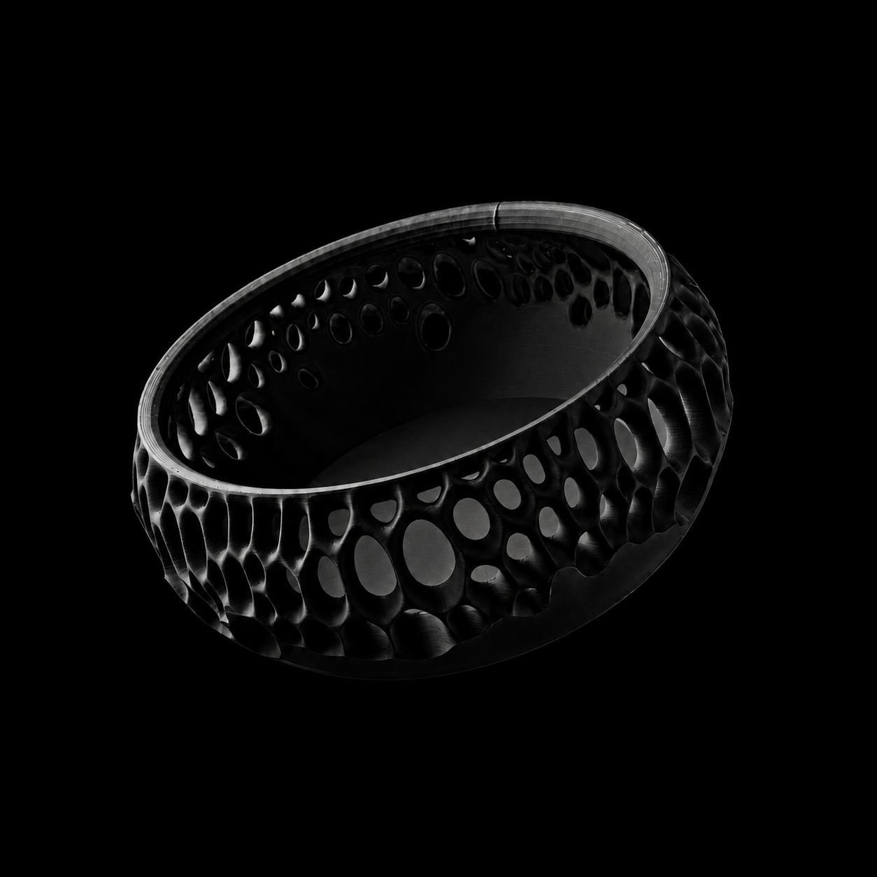 Modern Machine lattice bowl showing intricate openwork design and smooth ceramic surface for serving or decorative use.