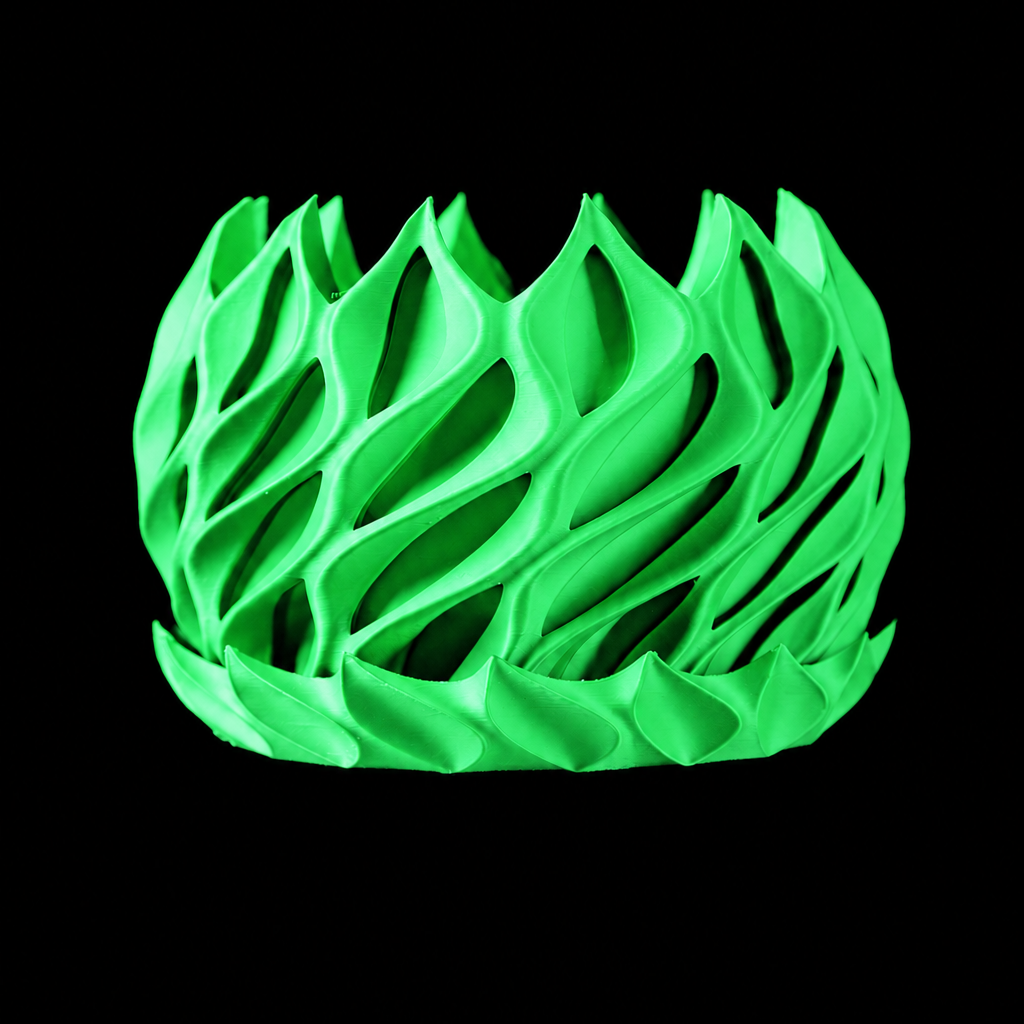 Modern Machine Helix Planter with sleek, spiral design ideal for indoor or outdoor plants, shown in a stylish black finish.
