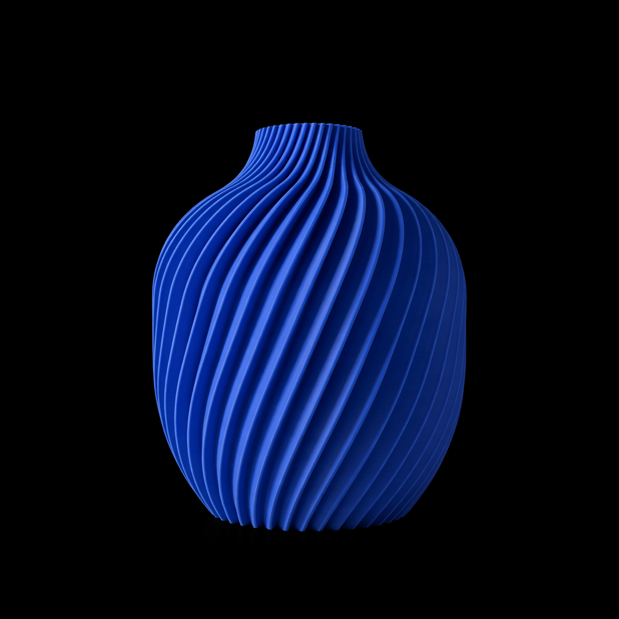 Modern Machine Vortex Vase with a sleek, twisted design in clear glass, perfect for modern home decor.