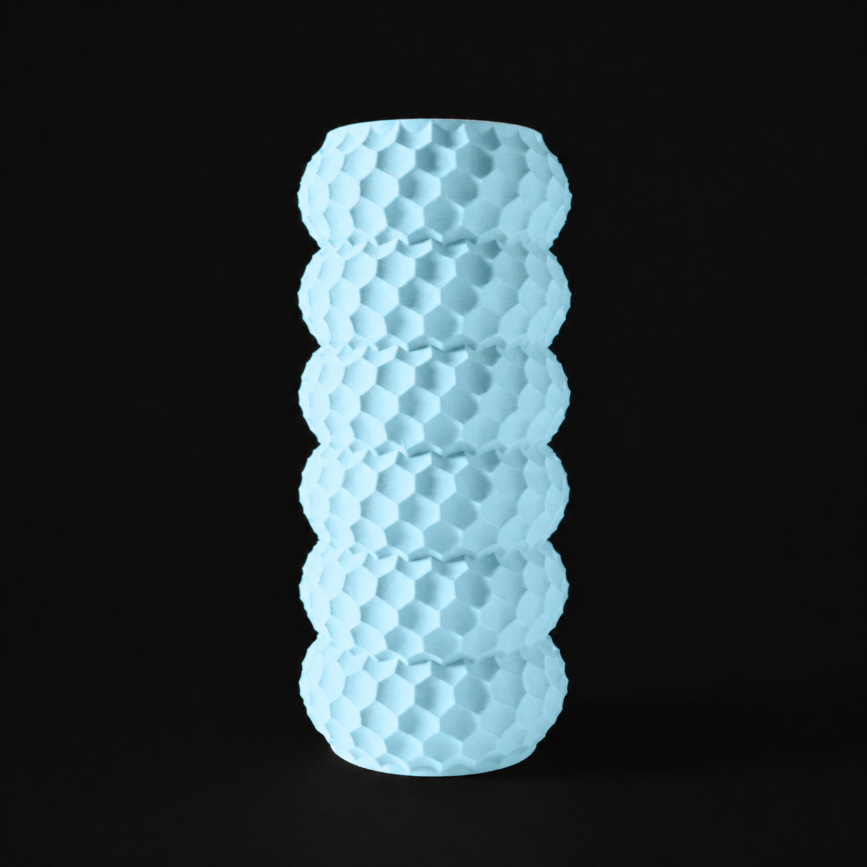Modern Machine Splice Vase in sleek, modern design with a smooth, curved surface and neutral color for contemporary home decor.