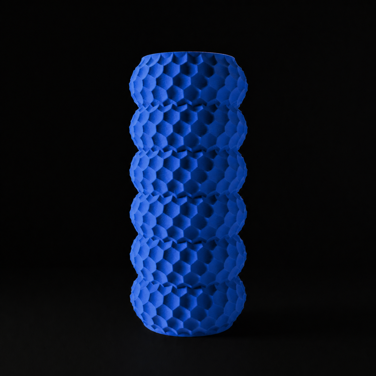 Modern Machine Splice Vase with a sleek, modern design featuring interwoven ceramic patterns, suitable for decorative floral arrangements.