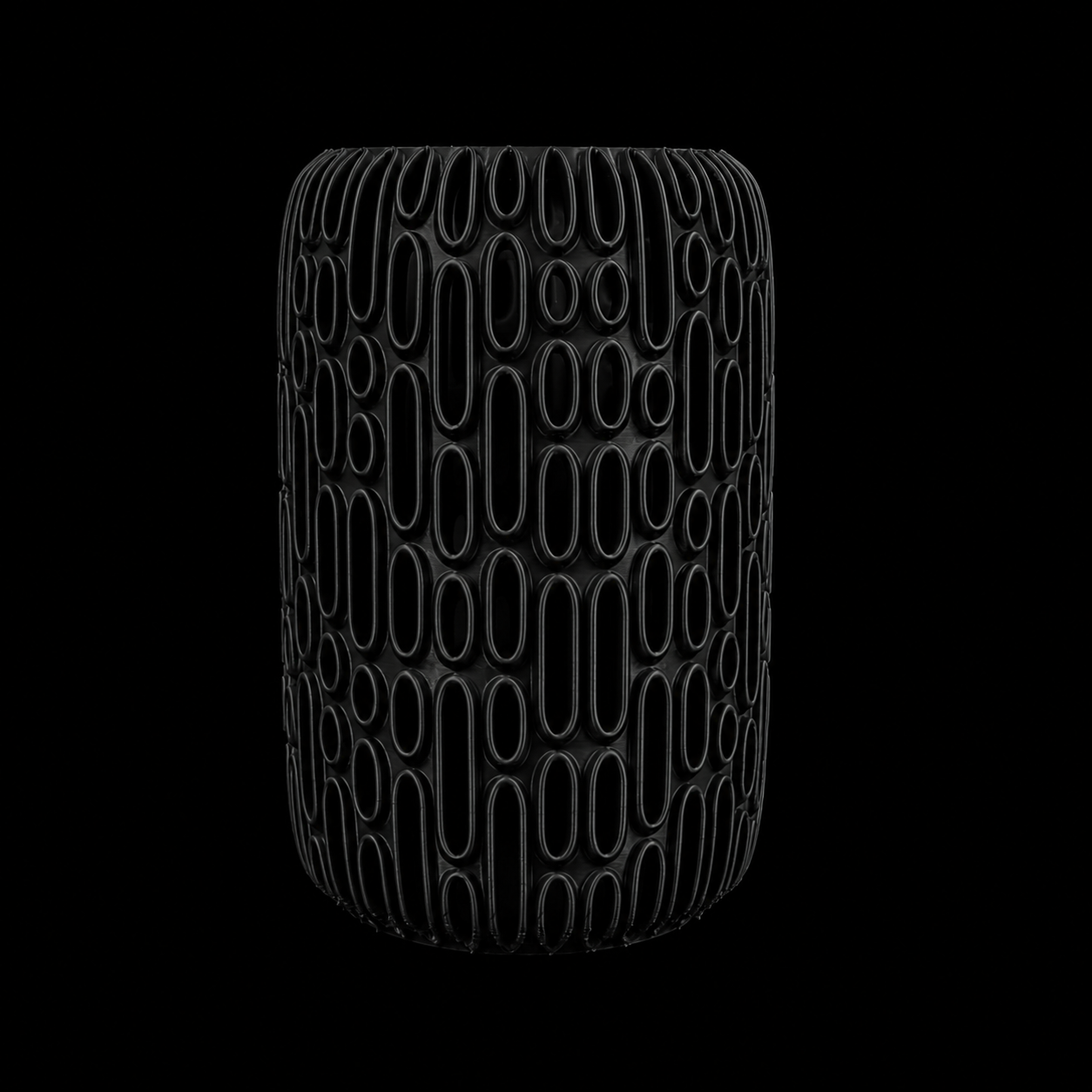 Modern Machine Orbit Vase with sleek, rounded ceramic design and smooth finish, perfect for modern home decor.