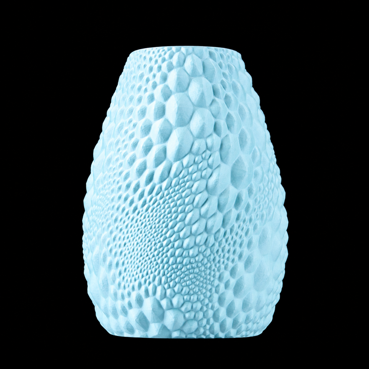 Modern Machine Pebbleform Vase in neutral tones, showcasing its textured pebble surface and elegant, rounded shape.