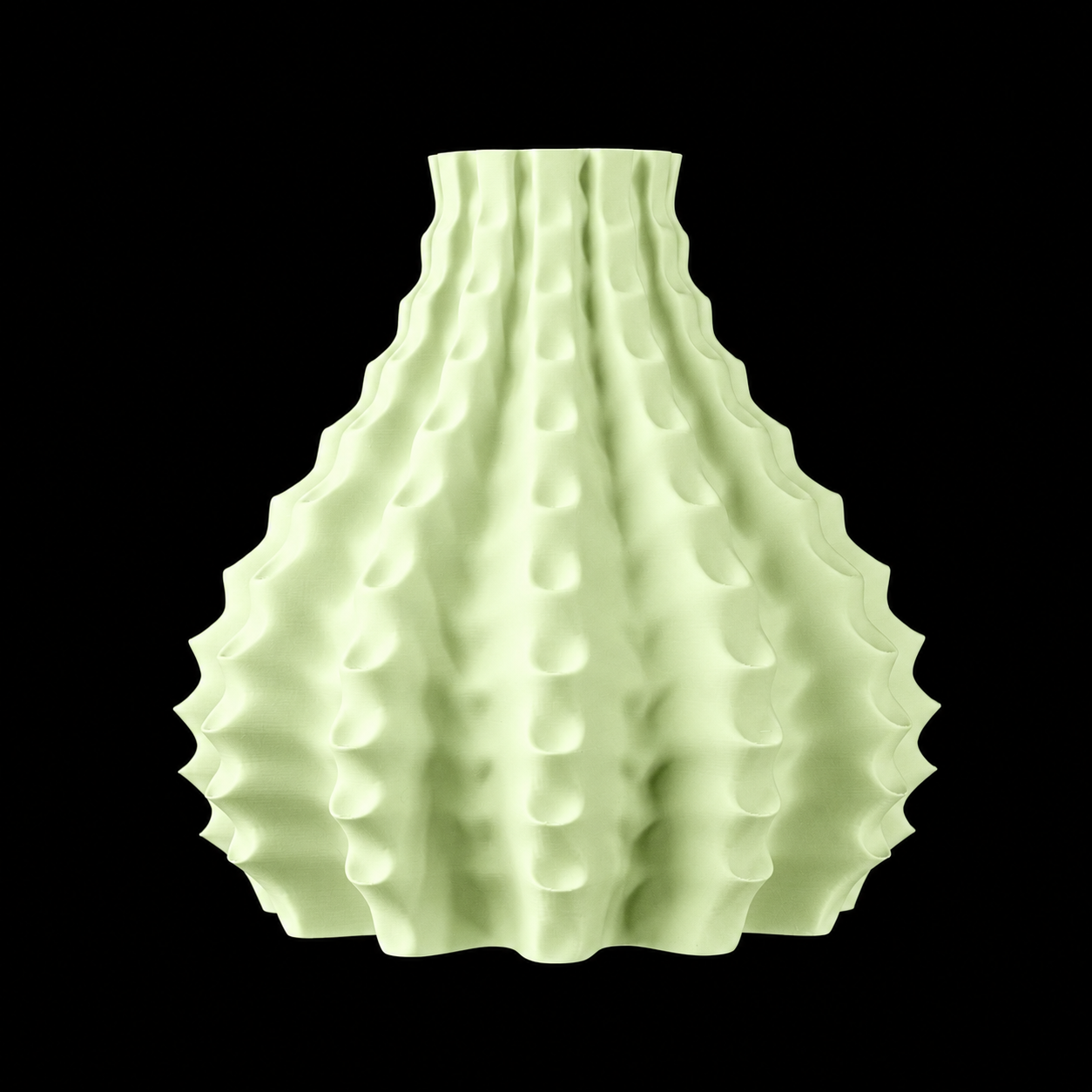Modern Machine Rippleform Vase with a textured ripple design, showcasing a sleek, contemporary ceramic vessel.