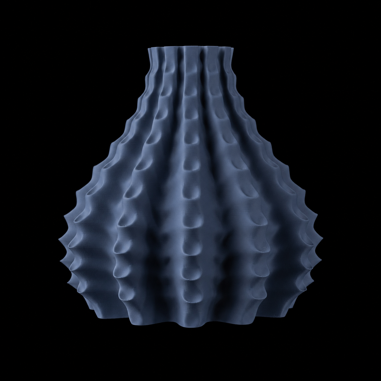 Modern Machine Rippleform Vase with a textured, ripple design in a sleek, contemporary style.