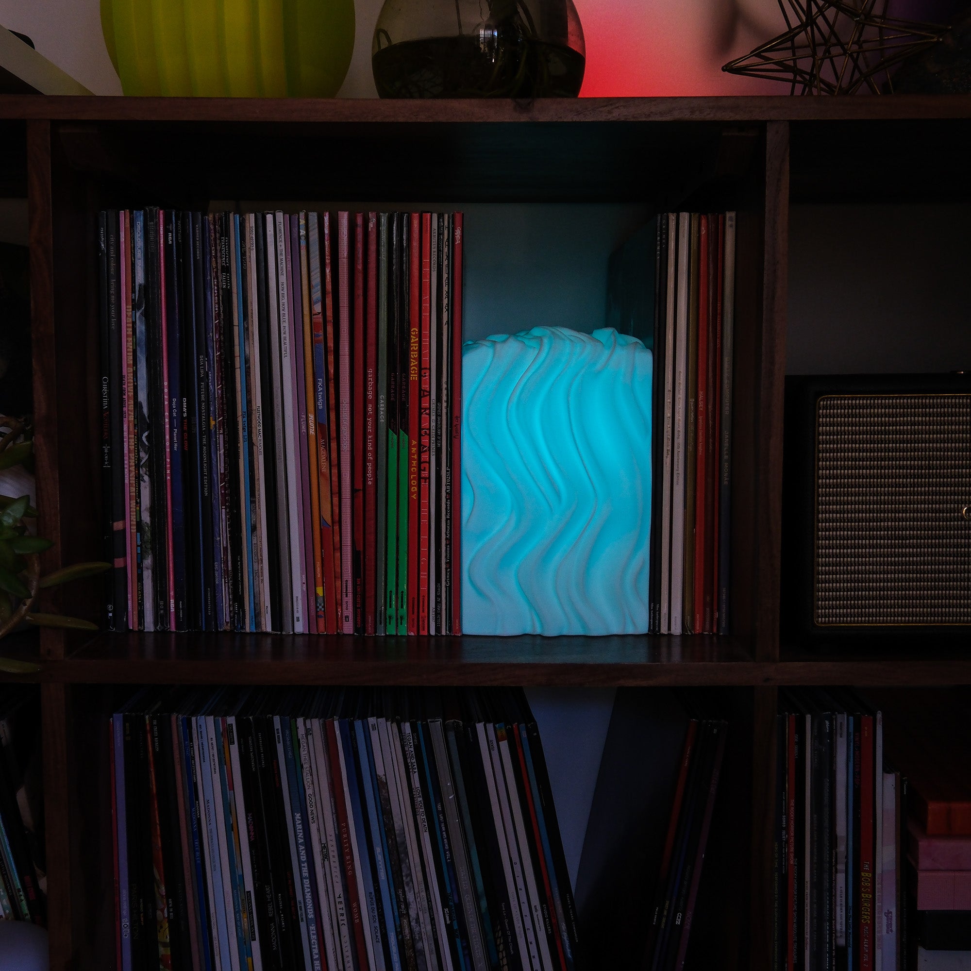 Noctis Studio Parallax Lamp with layered, geometric design and warm lighting, showcasing modern decorative lighting for home or office.