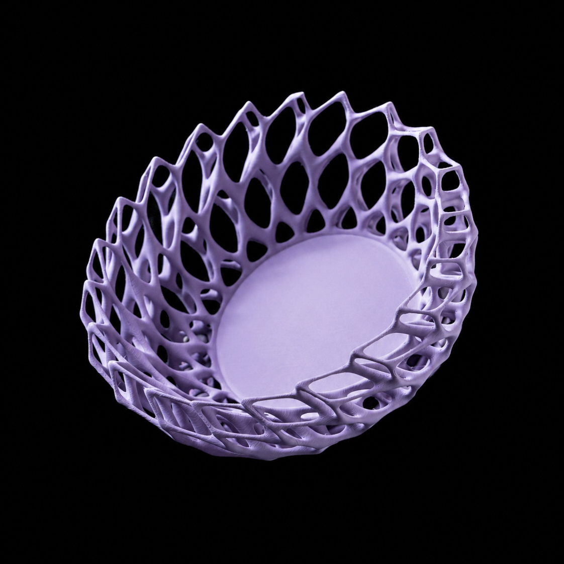 Modern Machine Nightbloom Bowl featuring a twisted design, showcasing its unique ceramic bowl with a textured, artistic finish.