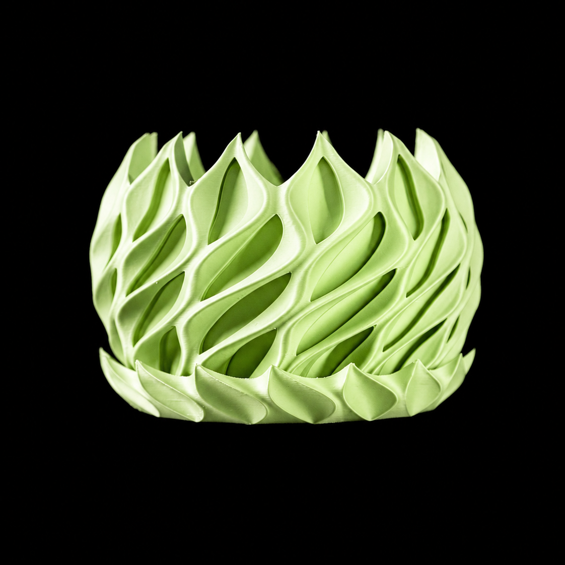 Modern Machine Helix Planter with twisted ceramic design, ideal for indoor or outdoor plant display.
